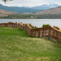 Part of backyard, garden with lake and mountain view Royalty Free Stock Photo