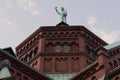 Part of the Basilica of Saint Louis the King with a statue of Saint Francis on the dome. Royalty Free Stock Photo