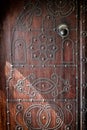 Part of a beautiful ancient wooden door in Arabic style.