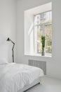 Part of bedroom interior design in white apartment Royalty Free Stock Photo