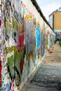 Part of the Berlin wall full of graffiti