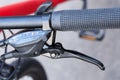 Part of bicycle handlebar with brake lever and shifting mechanism Royalty Free Stock Photo