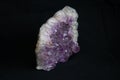 Part of big geode found in europe white and purple crystals in the inside Royalty Free Stock Photo