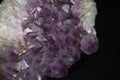 Part of a big geode found in europe white and purple crystals in the inside Royalty Free Stock Photo