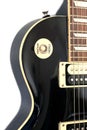 Part of black color electric guitar Royalty Free Stock Photo