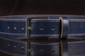 Part of a blue leather belt Royalty Free Stock Photo