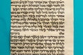 Part of the Book of Esther is written in Hebrew on parchment for Purim, blue background for the editor - in Hebrew - the first ch