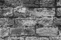 Part of a Brick Wall. Background or Texture. Surface of ancient obsolete Brickwall Outside the Street. Close Up Texture