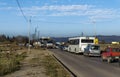 Part from bridge above new construction of road with rows of cars