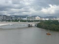 Part from a bridge before shore with residential houses