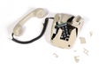 Part of a broken old telephone, phone with dial plate - plastic phone Royalty Free Stock Photo