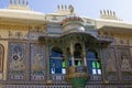 Part of the building of the city palace of Udaipur in India with an ornament