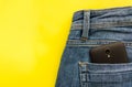 Part of cellphone in blue jeans back pocket Royalty Free Stock Photo