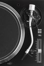 Part of dj turntable with tonearm Royalty Free Stock Photo