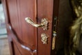 Part of the door. Antique luxury door knob. Elegant handle Royalty Free Stock Photo