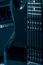 Part electric guitar and classic amplifier on a dark background Royalty Free Stock Photo