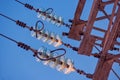 Part of Electricity transmission power line - High voltage tower - with glass insulators Royalty Free Stock Photo