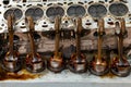 Part of the engine removed from a used car for repairing silver metal and aluminum with six pistons in oil on a workbench in a Royalty Free Stock Photo