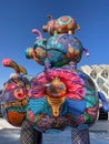 Part of exposition by Hung Yi. Colourful pigs sculpture with oriental patterns