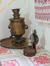 part of the exposition - an old samovar and a kerosene lamp in the museum `Chekhov`s House` Royalty Free Stock Photo