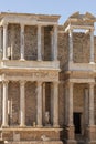 Part of the facade with columns, capitals and statues of the Roman theater of Merida a typical sunny day in Badajoz, Extremadura, Royalty Free Stock Photo