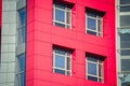 Part of the facade modern building with red and blue Royalty Free Stock Photo