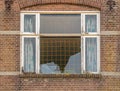 Part of the facade of an old Dutch house ready for demolition Royalty Free Stock Photo