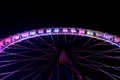 Part of ferris wheel in funfair at night Royalty Free Stock Photo