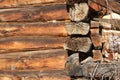 Part of the frame of an old log village bath. The cut surface of old logs. Detail of cut old logs. Royalty Free Stock Photo