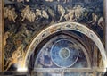 Part of the frescoes in the Collegiata Santa Maria Assunta at San Gimignano representing the gruesome torments of hell. Royalty Free Stock Photo