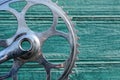 Part of a gray iron bicycle sprocket