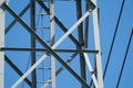 A part of a high-voltage electrical insulator electric line against the blue sky Royalty Free Stock Photo