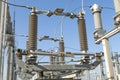 Part of high-voltage substation on blue sky background with switches and disconnectors. Ukrainian energy infrastructure