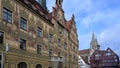 Part of historic Town Hall with beautiful paintings and Ulm Minster, Ulmer Muenster, in Ulm on Romantic Road in South Germany Royalty Free Stock Photo