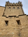 Part of Hohenzollern Castle tower and outside fortifications wit embrasures Royalty Free Stock Photo