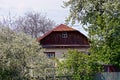 The part of the house in a flowered garden Royalty Free Stock Photo