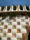 Part of the inside entrance wall in Guell Park, covered with tiles and mosaic, designed by Gaudi