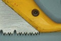 Part of an iron saw with sharp teeth Royalty Free Stock Photo