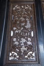 A part of a large screen inside Chen Clan Academy, using folk sculptures carved from carved craft, trees, flowers, birds