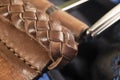 Part of leather belt with stitching. Men`s belt. Leather belt with metallic clasp. Clothes accessory. Trendy clothes accessories.