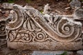 The part of marble frieze detail, volute and lotus. Ephesus, Turkey