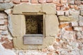 Part of Medieval castle in ruin with windows with sandstone jamb.