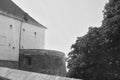 Part of medieval Cerveny Kamen Red Stone Castle near Casta village, Slovakia. Black and white filter Royalty Free Stock Photo