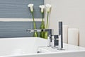 Part of modern bathroom in blue and gray tones