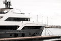 Part of a modern luxury yacht, parked boat in the marina Royalty Free Stock Photo