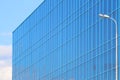 Part of modern new blue building with windows Royalty Free Stock Photo