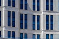 Part of modern office building with blue windows closeup