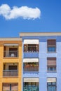Part of modern residential apartment house building with blue sky background Royalty Free Stock Photo