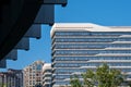 Part of modern urban glass mixed buildings is in blue sky and good weather