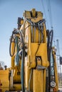 Part of modern yellow excavator machines. Royalty Free Stock Photo